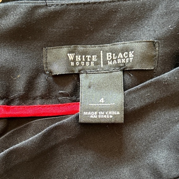 White House Black Market, size 4, black/ white polka dot mini skirt w/ ruffles - Picture 2 of 9